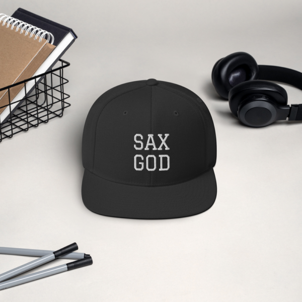 Black cap with 'SAX GOD' text